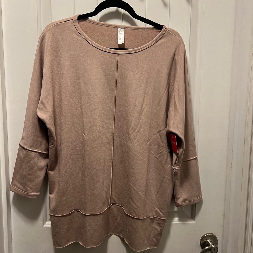 Light tan dolman sleeve sweatshirt never worn non-smoking home tags attached